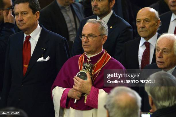 Bishop Vincenzo de Gregorio brings the ampulla that contains the blood of San Gennaro before the arrival of Pope Francis at the Duomo as part of his...