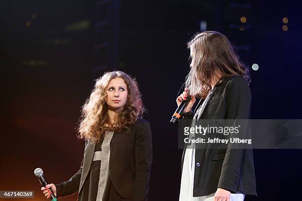 Maria Alyokhina and Nadezhda Tolokonnikova of Pussy Riot speak during the Amnesty International "Bringing Human Rights Home" Concert at the Barclays...