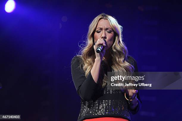 Singer Colbie Caillat performs during the Amnesty International "Bringing Human Rights Home" Concert at the Barclays Center on February 5, 2014 in...