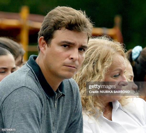 Antonio Castro, , son of Cuban President Fidel Castro, and his mother, wife of Castro, Dalia Soto del Valle, participate in a ceremony honoring the...