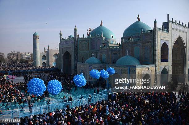 Afghan revellers gather in front of the Hazrat-e-Ali shrine for Nowruz festivities which marks the Afghan new year in Mazari-i-Sharif on March 21,...