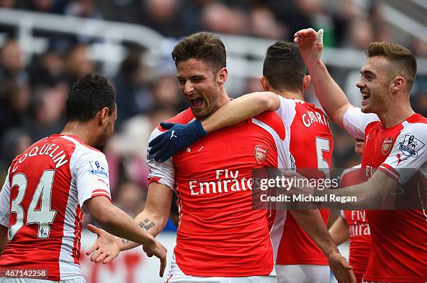 Olivier Giroud of Arsenal celebrates scoring his second goal with Francis Coquelin and Calum Chambers of Arsenal during the Barclays Premier League...