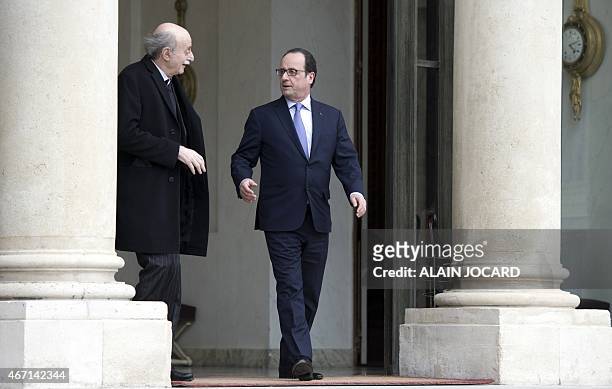 French President Francois Hollande bids farewell to Lebanese Druze leader and Lebanese Progressive Socialist Party chairman Walid Jumblatt after a...