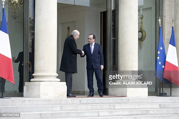 French President Francois Hollande bids farewell to Lebanese Druze leader and Lebanese Progressive Socialist Party chairman Walid Jumblatt after a...