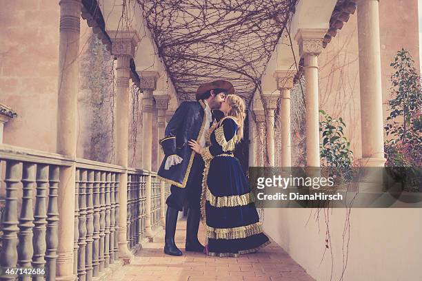 romeo and juliet kissing juliets at beautiful balcony - juliet capulet stock pictures, royalty-free photos & images