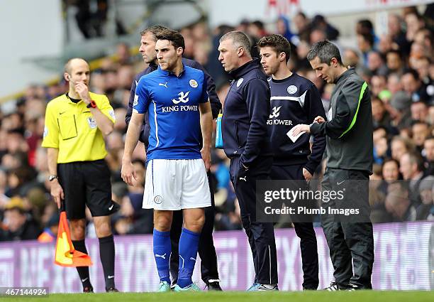 Matty James of Leicester City receives instructions from manger Nigel Pearson during the Premier League match between Tottenham Hotspur and Leicester...