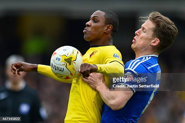 Odion Ighalo of Watford and Christophe Berra of Ipswich Town during the Sky Bet Championship match between Watford and Ipswich Town at Vicarage Road...