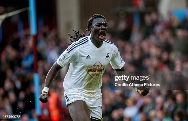 Bafetimbi Gomis of Swansea City celebrates his goal during the Barclays Premier League match between Aston Villa and Swansea City at Villa Park on...