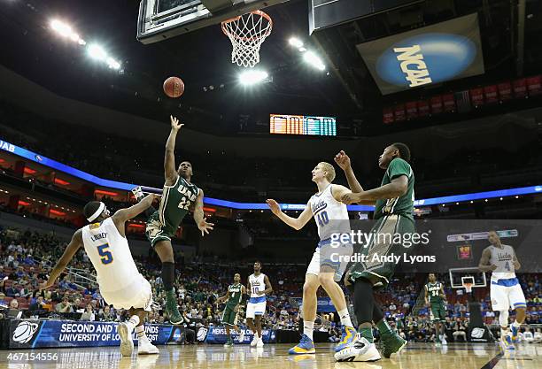 Tyler Madison of the UAB Blazers shoots over Kevon Looney of the UCLA Bruins during the third round of the 2015 NCAA Men's Basketball Tournament at...