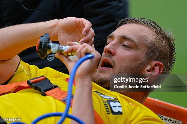 Joel Ekstrand of Watford goes off with gas and air after a bad injury during the Sky Bet Championship match between Watford and Ipswich Town at...