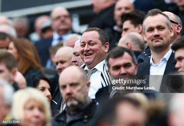 Newcastle owner Mike Ashley smiles during the Barclays Premier League match between Newcastle United and Arsenal at St James' Park on March 21, 2015...