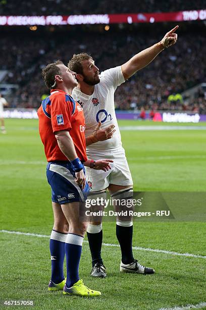 Chris Robshaw of England talks to Referee Nigel Owens of Wales after England's second try during the RBS Six Nations match between England and France...
