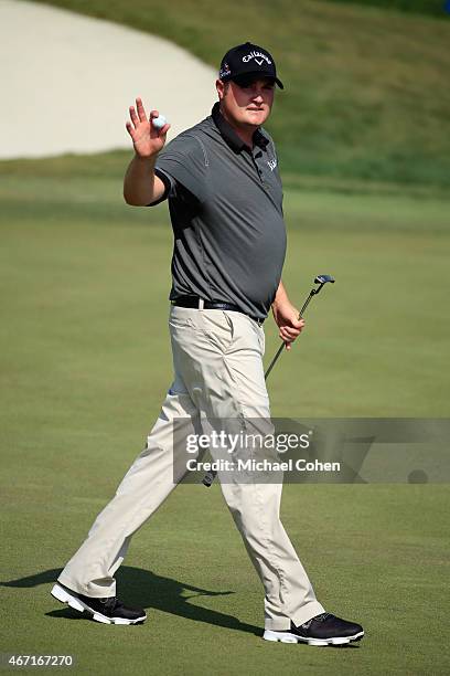 Jason Kokrak of the United States waves after putting on the 18th hole to complete his third round of the Arnold Palmer Invitational Presented By...