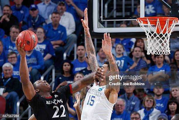 Coreontae DeBerry of the Cincinnati Bearcats goes to the basket against Willie Cauley-Stein of the Kentucky Wildcats during the third round of the...