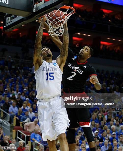 Kentucky's Willie Cauley-Stein dunks on Cincinnati's Octavius Ellis in the third round of the NCAA Tournament on Saturday, March 21 at the KFC Yum!...