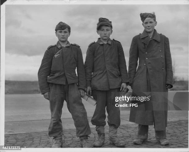 Young German boys of Hitler's 'Air Guard', captured by the US Third Army during World War Two, Giessen, Germany, circa 1944-1945.