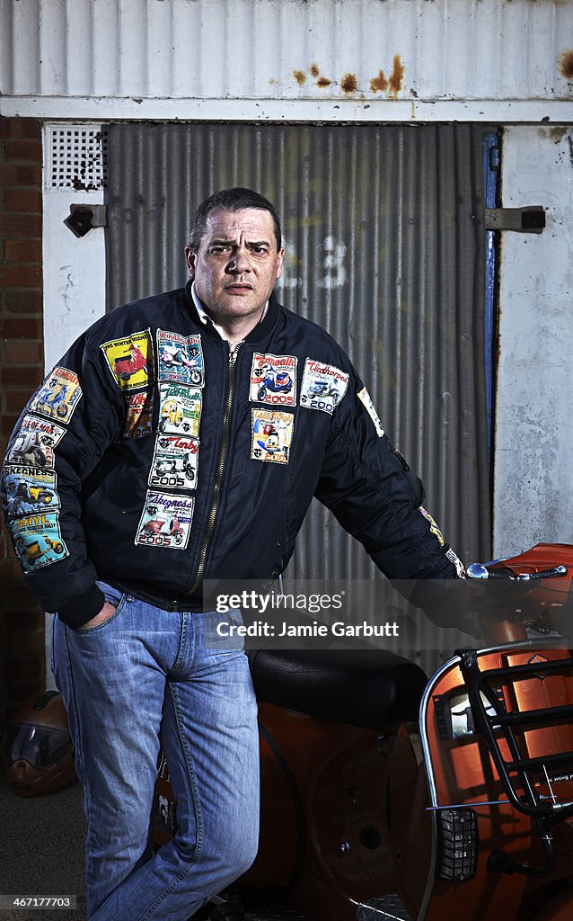 Male scooterist posing with Scooter