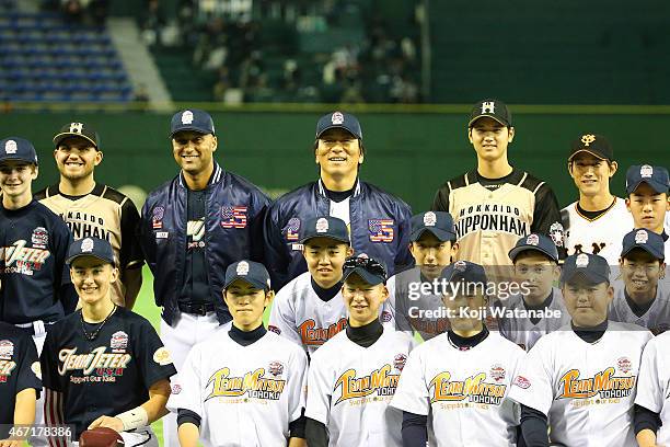 Former New York Yankee players Derek Jeter and Hideki Matsui and Shohei Otani of Hokkaido Nippon-Ham Fighters and Seiji Kobayashi of Yomiuri Giants...