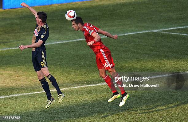 Matt Hedges of FC Dallas heads the ball behind Sebastien Le Toux of Philadelphia Union at PPL Park on March 21, 2015 in Chester, Pennsylvania. Dallas...