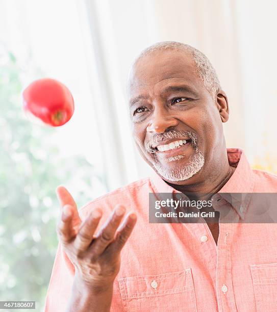 1,073 Throwing An Apple Stock Photos, High-Res Pictures, and Images ...