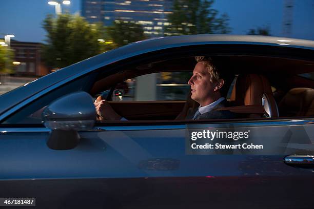 usa, texas, dallas, profile of businessman driving car - car side profile people stock pictures, royalty-free photos & images