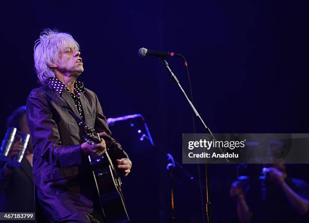 Bob Geldof, member of Russian punk group Pussy Riot performs at Amnesty International's "Bringing Human Rights Home" concert at the Barclays Center...