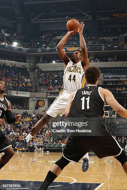 Solomon Hill of the Indiana Pacers shoots against the Brooklyn Nets during the game on March 21, 2015 at Bankers Life Fieldhouse in Indianapolis,...