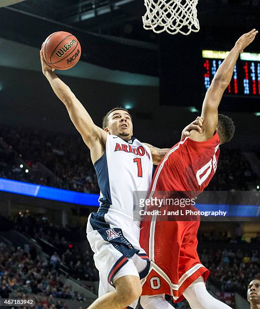 Gabe York of the Arizona Wildcats attempts a dunk against Ohio State Buckeyes during the third round of the NCAA Men's Basketball Tournament at the...