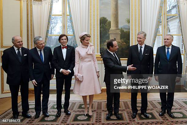 French Foreign Affair Minister Laurent Fabius, Belgian Foreign Minister Didier Reynders, Belgian Prime Minister Elio Di Rupo, Queen Mathilde of...