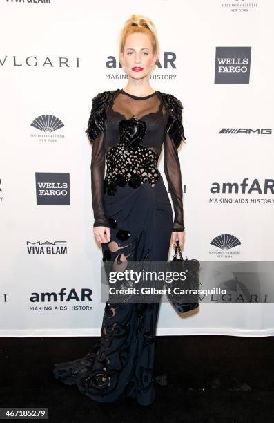 Poppy Delevingne attends the 2014 amfAR New York Gala at Cipriani Wall Street on February 5, 2014 in New York City.