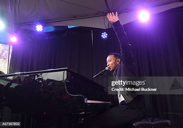 Musician John Legend performs at the Axe/Spin House during the 2015 SXSW Music, Fim + Interactive Festival at Cheer Up Charlie's on March 21, 2015 in...