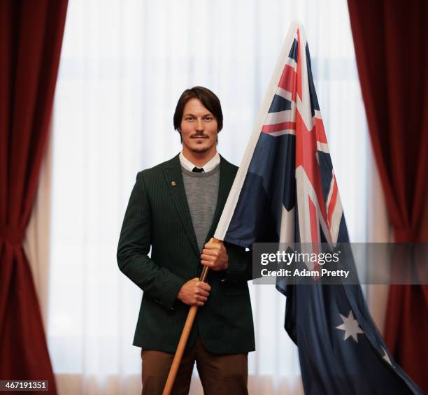 Alex Pullin of Australia poses with the Australian Flag after being announced as the Flag Bearer for Australia at the Sochi Olympics Opening Ceremony...