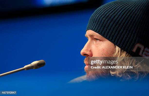 Skier Erik Fisher looks on during a press conference of the US Alpine Ski team at the Gorki media center in Rosa Khutor, near Sochi, on February 6,...