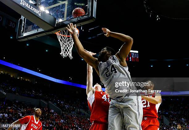 Joshua Smith of the Georgetown Hoyas goes up against Jakob Poeltl of the Utah Utes in the second half during the third round of the 2015 NCAA Men's...