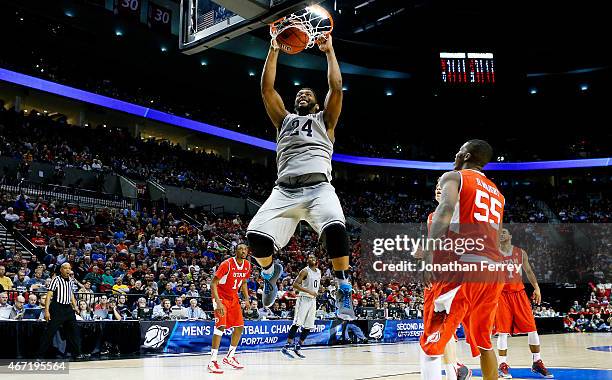 Joshua Smith of the Georgetown Hoyas dunks in the second half Utah Utes during the third round of the 2015 NCAA Men's Basketball Tournament at Moda...