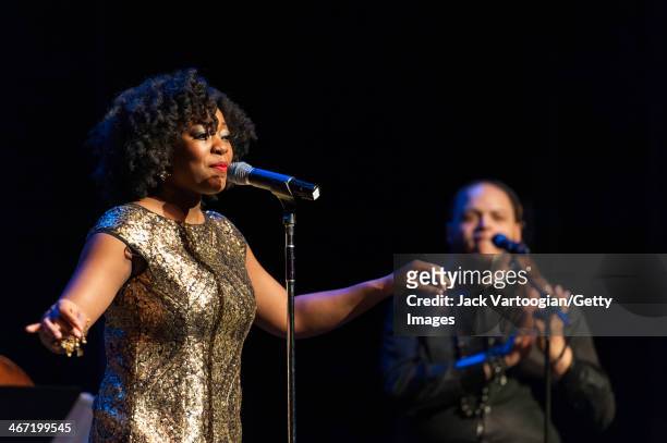 American vocalist Alicia Olatuja leads her band during a Carnegie Hall Weill Music Institute Neighborhood Concert at the Langston Hughes Auditorium...
