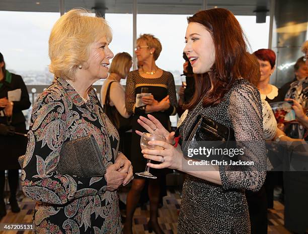 Camilla, Duchess of Cornwall chats with singer Hayley Westenra as they celebrate success of New Zealand women in the UK on Waitangi day at New...