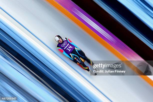 Valentin Cretu of Romania takes part in a men's luge training session ahead of the Sochi 2014 Winter Olympics at the Sanki Sliding Center on February...