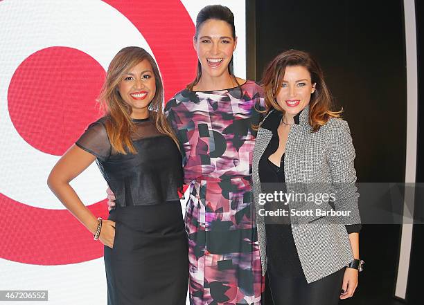 Target designers Dannii Minogue and Giaan Rooney pose with Australian singer Jessica Mauboy on the runway at the Target show during Melbourne Fashion...