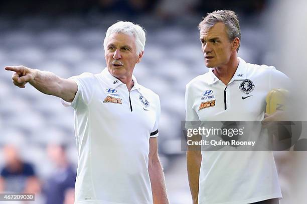 Head coach Michael Malthouse of the Blues talks to assistant coach Dean Laidley during the NAB Challenge AFL match between the Carlton Blues and the...