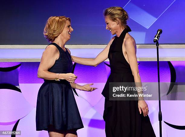 President Sarah Kate Ellis and actress Portia de Rossi onstage during the 26th Annual GLAAD Media Awards at The Beverly Hilton Hotel on March 21,...