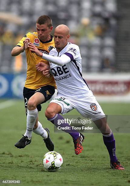 Hayden Morton of the Mariners and Ruben Zadkovich of the Glory contest the ball during the round 22 A-League match between the Central Coast Mariners...