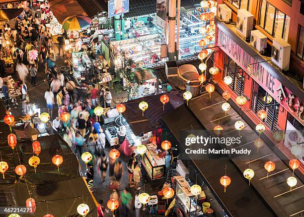 malaysia, kuala lumpur, chinatown at night - kuala lumpur street stock pictures, royalty-free photos & images