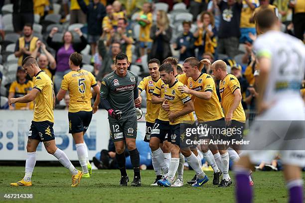 Mariners team mates celebrate a goal by Nick Montgomery during the round 22 A-League match between the Central Coast Mariners and the Perth Glory at...