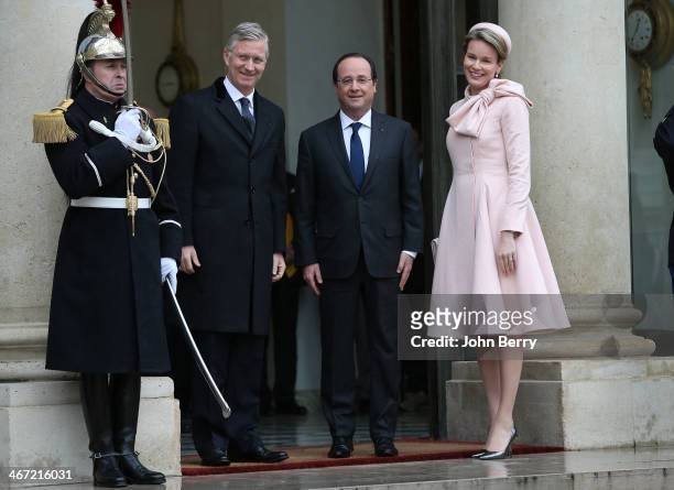 King Philippe of Belgium and Queen Mathilde of Belgium meet French President Francois Hollande during a one day official visit in Paris at the Elysee...
