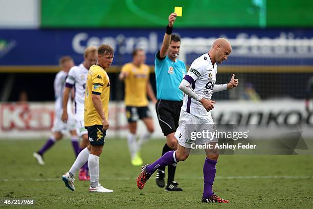 Ruben Zadkovich of Perth Glory accepts a yellow card during the round 22 A-League match between the Central Coast Mariners and the Perth Glory at...