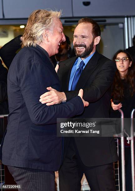 Alan Rickman and Ralph Fiennes attend the UK Premiere of "The Invisible Woman" at the ODEON Kensington on January 27, 2014 in London, England.