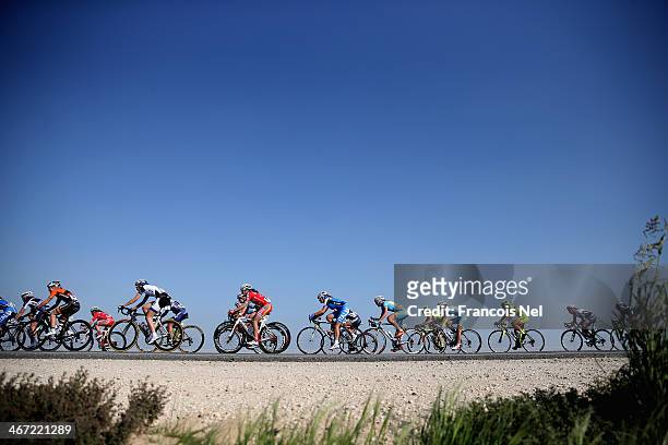 Riders make their way through Umm Slal Ali during stage three of the 2014 Ladies Tour of Qatar from Katara Cultural Village to Al Khor Corniche on...