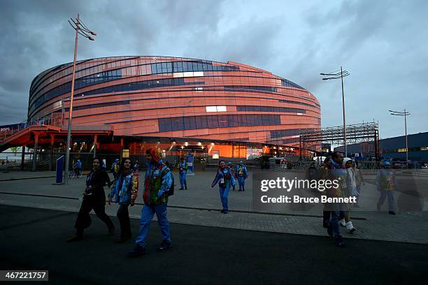 Volunteer exit the arena ahead of the Sochi 2014 Winter Olympics at the Shayba Arena on February 6, 2014 in Sochi, Russia.