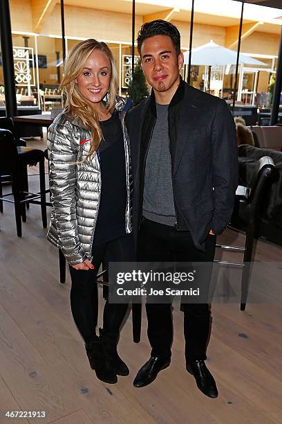 Olympians Nastia Liukin and Apolo Anton Ohno visit the USA House ahead of the Sochi 2014 Winter Olympics at the Olympic Park on February 6, 2014 in...